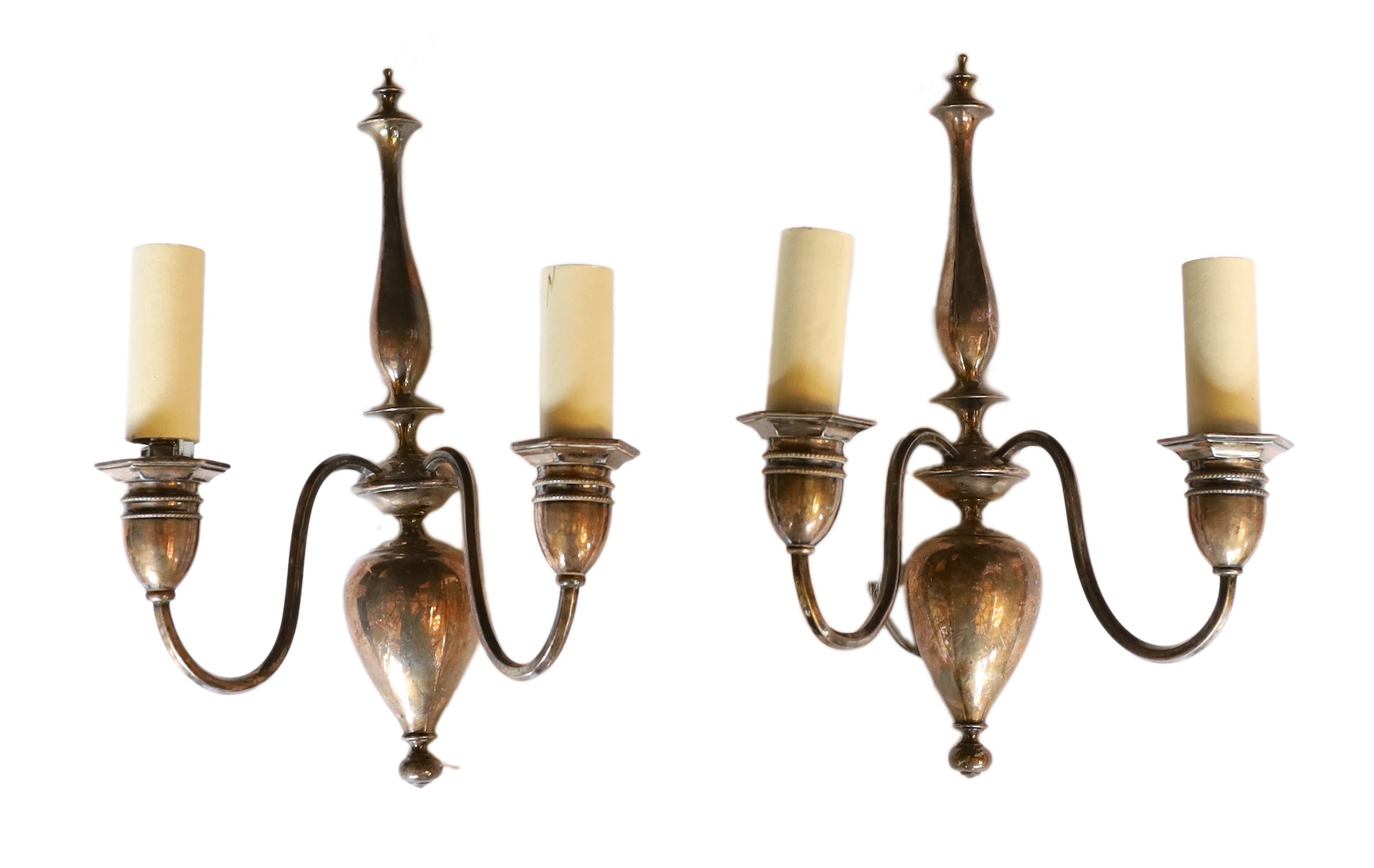 A pair of Edwardian silver plated brass wall lights, attributed to Faraday and Son, height 30cm. width 21cm